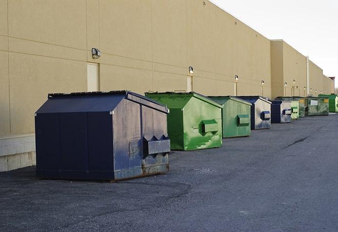 large roll-off dumpsters prepared for construction waste in Bagdad